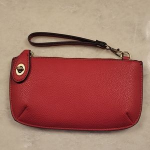 Red, vegan leather clutch